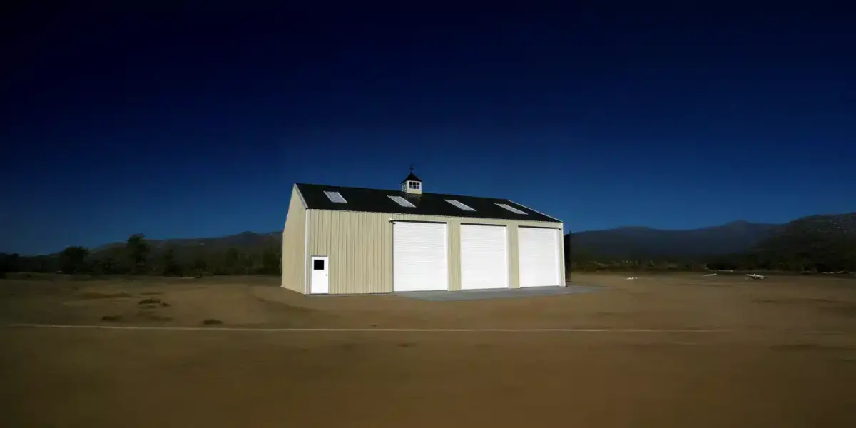 Overhead Doors — Sectional roll-up doors sized for vehicles and equipment, with framed and reinforced openings.