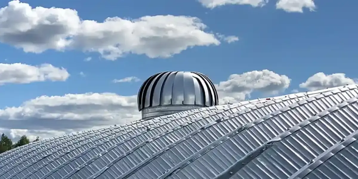 Turbine Vents — Wind-driven roof ventilators that exhaust hot, moist air without power.