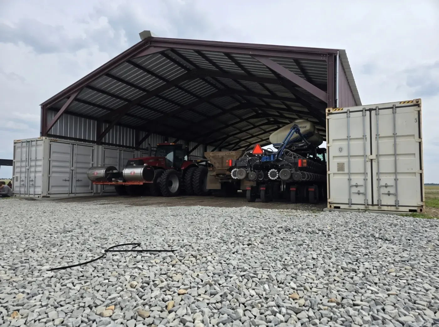 Container Covers — Two containers, one roof, covered space between